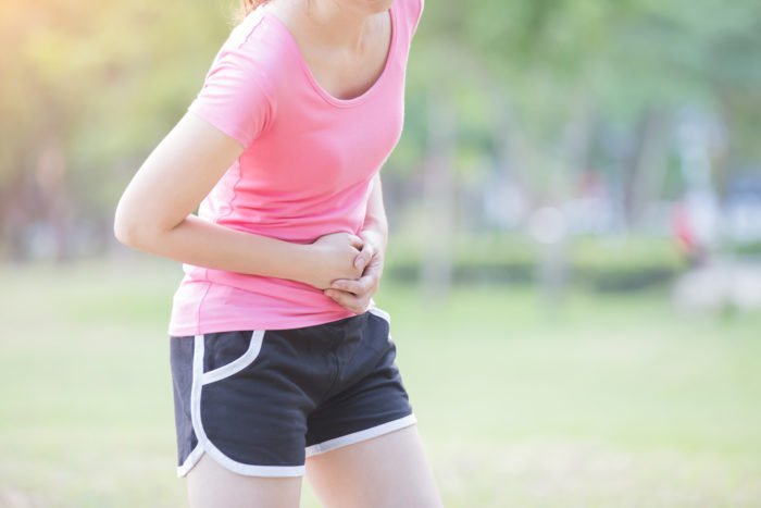 bolest v křečích žaludku při běhu