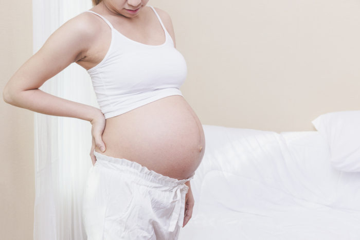 bolesti zad během těhotenství pomocí vyhřívací podložky